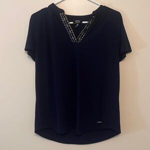 Blue v-neck blouse with gold stones